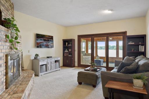 The lower level family room, a gathering place for everyone to convene and relax together at the end of the day.
Whether it's movie night, playing board games, gaming or getting some quality alone time curled up with a book and a wood burning fire!!