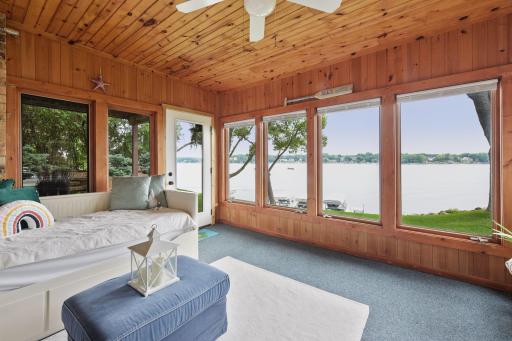 This four-season porch combines warm natural light and outdoor views with interior comforts, bridging the gap between indoors and nature. Itâs a place of calm and tranquility. Enjoy a cup of tea or coffee with a good book !!