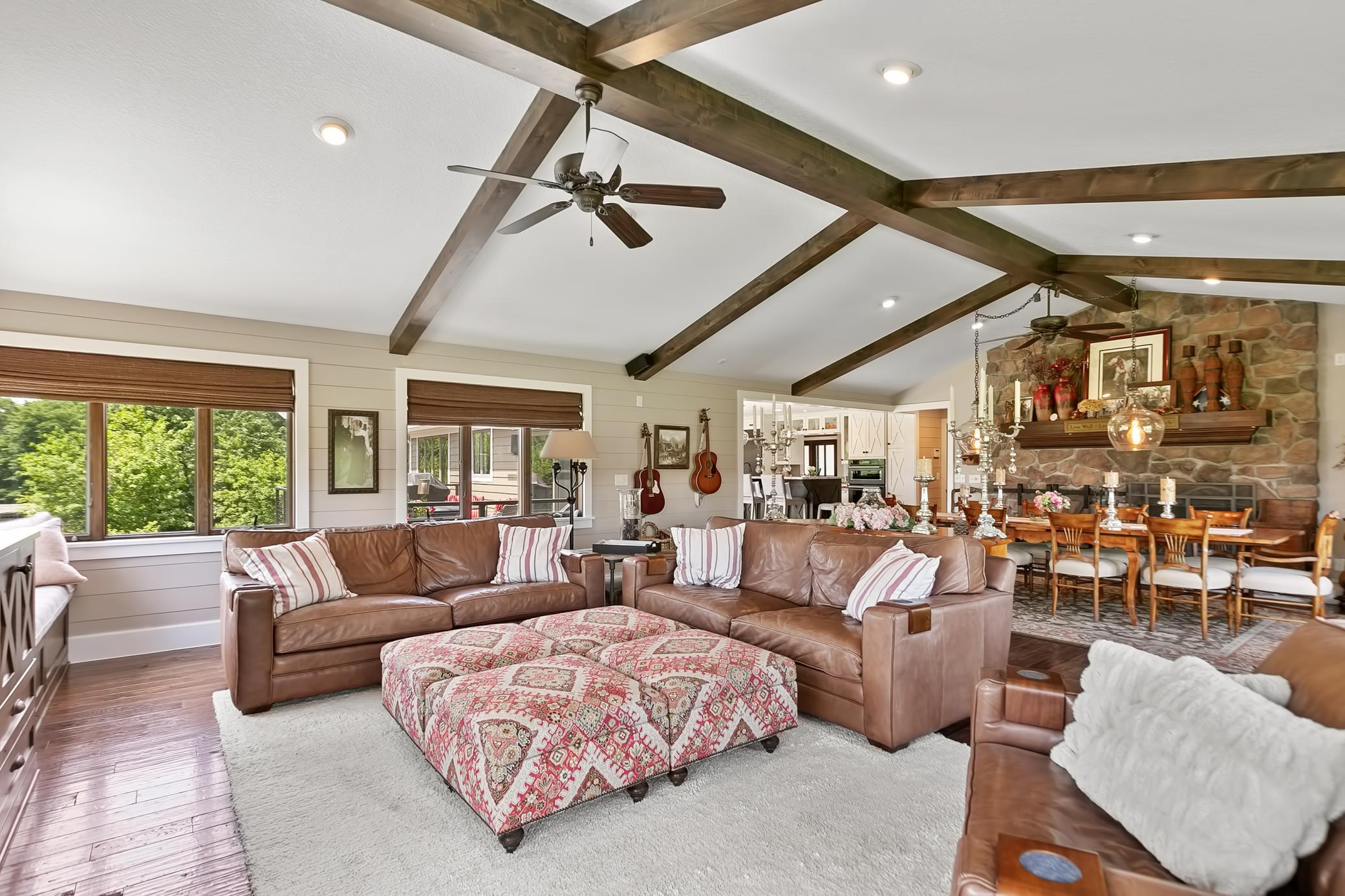 Sellers added this wonderful vaulted great room featuring the dining area and another gathering space.