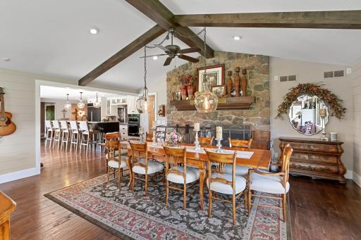 Wood burning fireplace with brick accent.