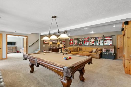 Game area is conveniently located in the lower level with great access to outdoor activities.