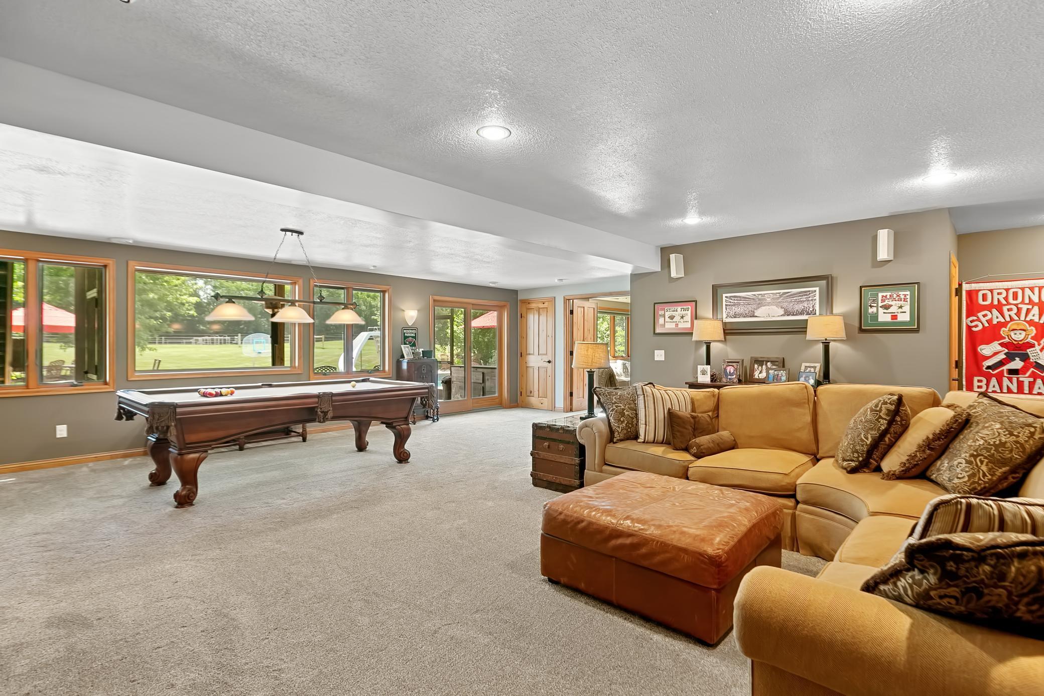 This view showcases the openness and accessibility to the screened in porch and pool.
