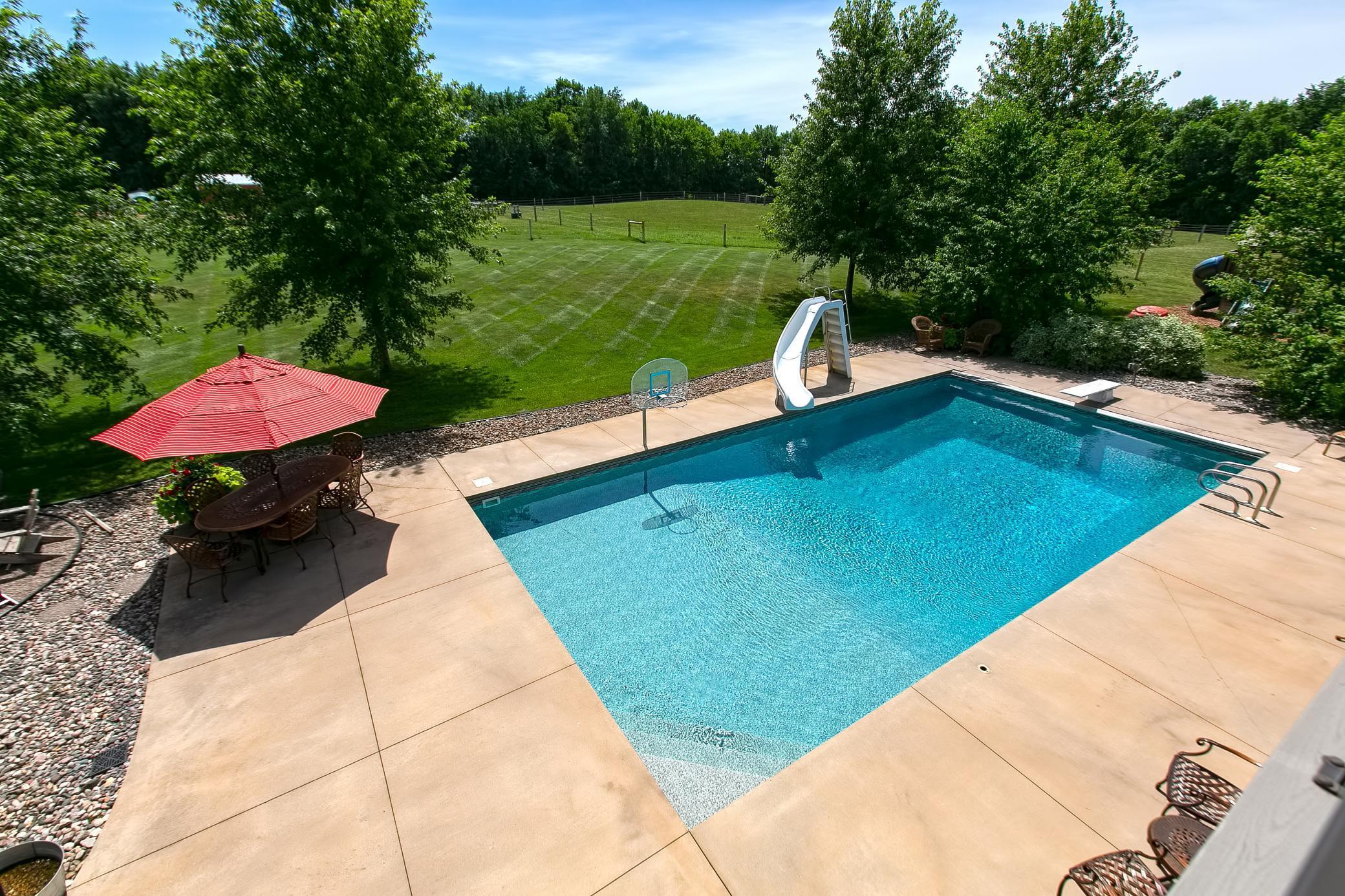 Newer heated pool with an automatic cover. Entry level of the pool is 3ft, and the deep end is 12ft.