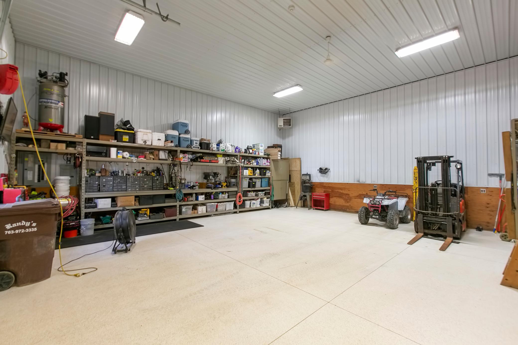 The heated shop is 30 X 33, has water and infloor heat.