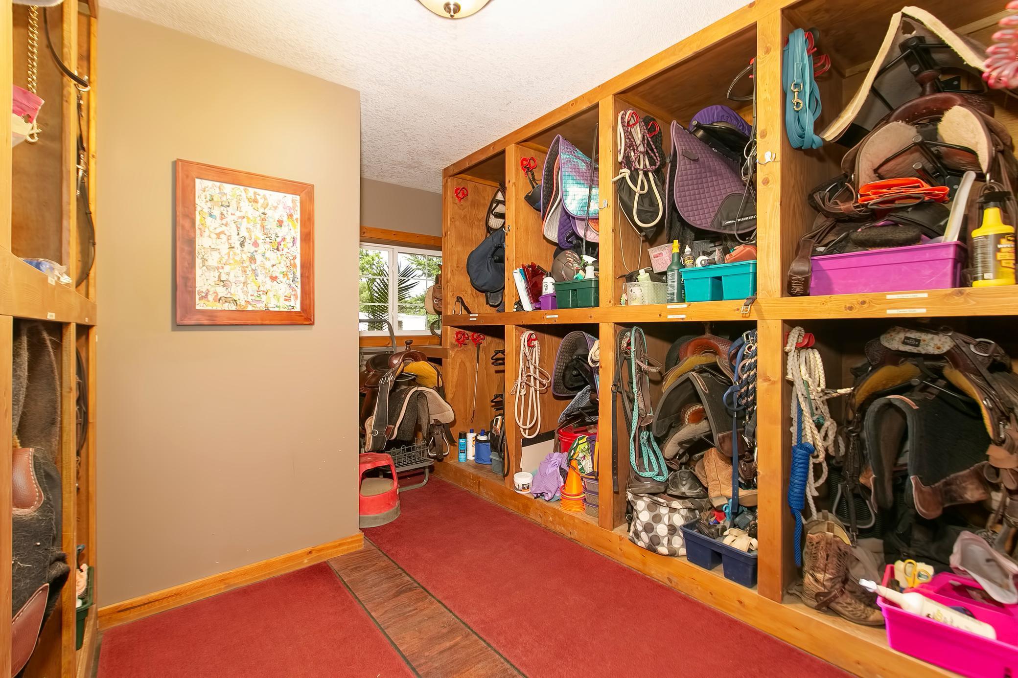 Very well laid out tack room.