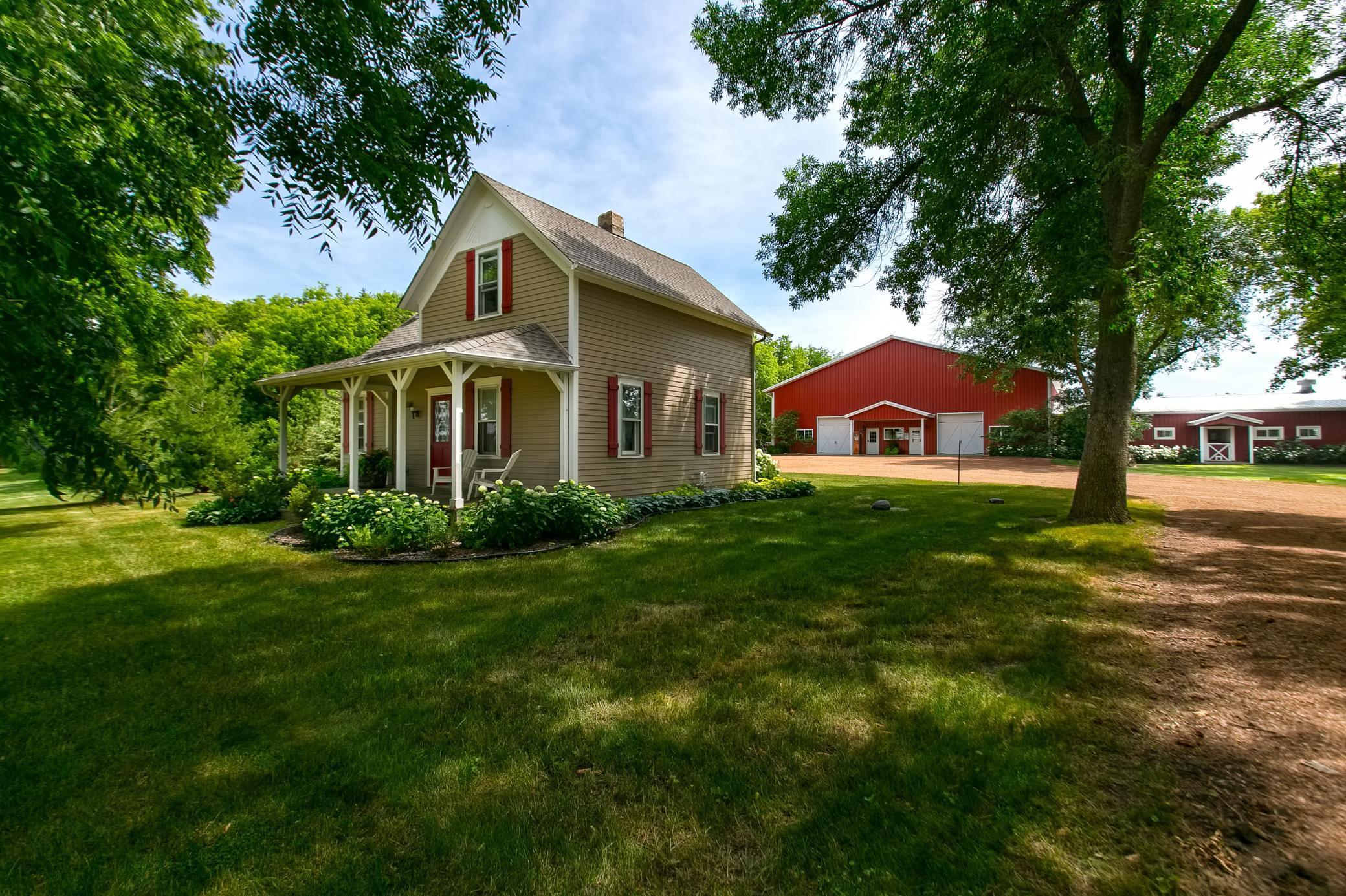 The charming farmhouse is completely private from the main house, yet close proximity to the barn.