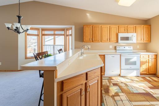Sunny Kitchen Opens to Living, Dining Area