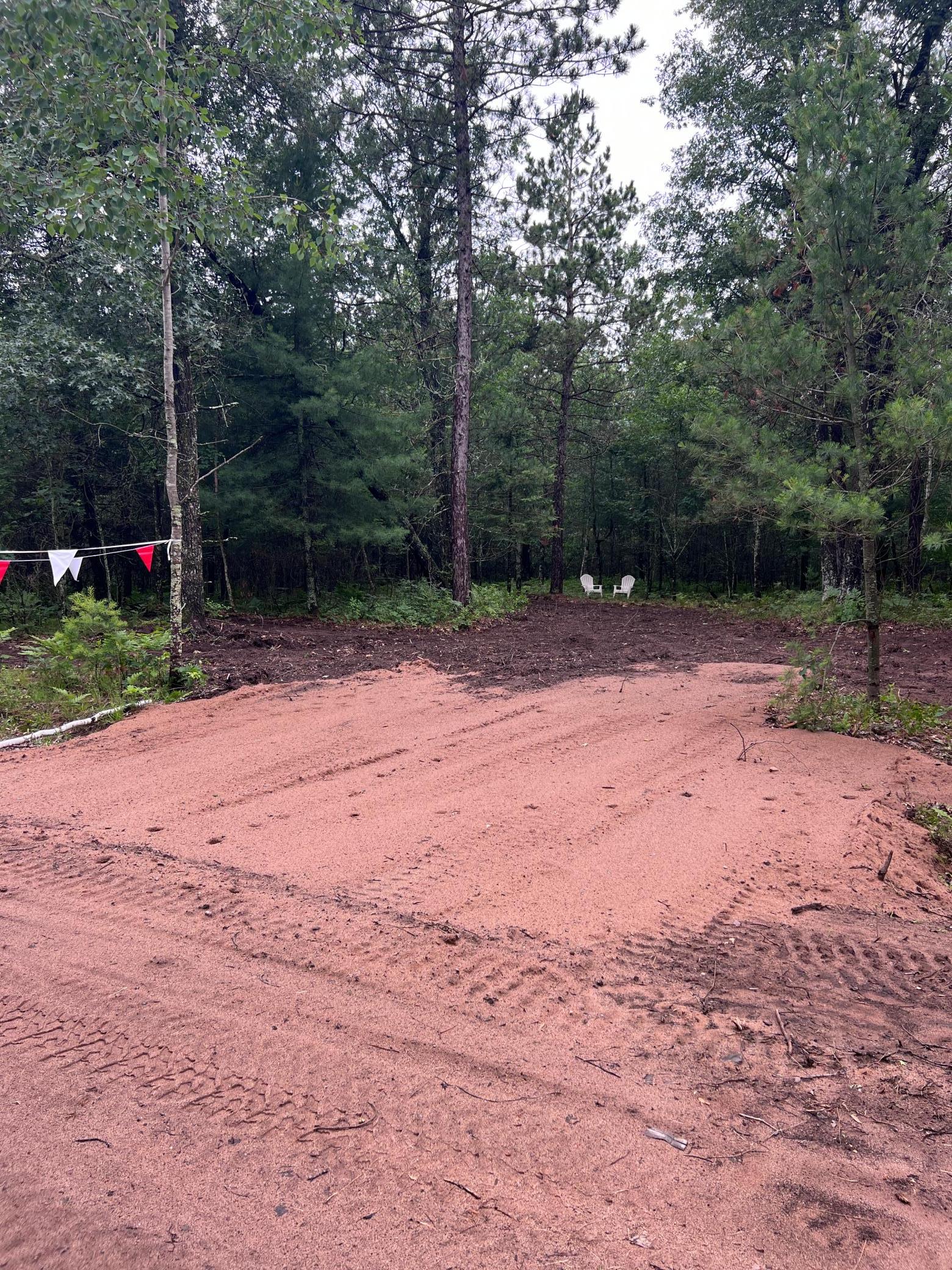 There is a clearing to allow for access to the parcel. See what this Northwoods location has to offer.