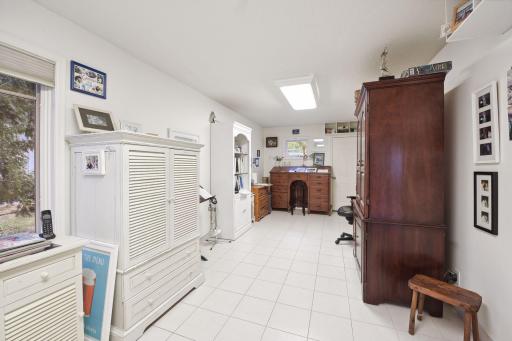 A large main level office is available if desired OR a 5th bedroom, on the main level, could easily be re-designed here with a closet already in place.