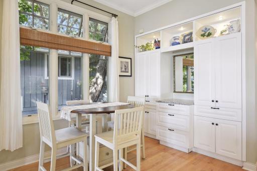 Custom built-ins have been added for additional storage or a main level bar area.