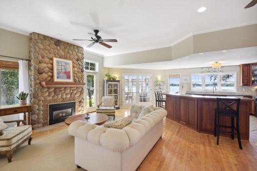 The living room and kitchen flow together which allows for uninterrupted conversation.