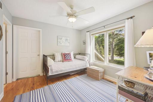 The 3rd upper level bedroom offers a spacious closet, ceiling fan, 3/4 en-suite bathroom and access to the Bonus Room.