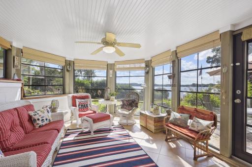 The screened in porch allows for an outdoor feel minus the mosquito's. Retractable vinyl windows allows you to enclose this space and continue your stay if the winds come across the bay. A door gives access to the patio.