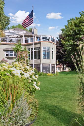 The yard offers a gradual slope for ease and accessibility to and from the lake.