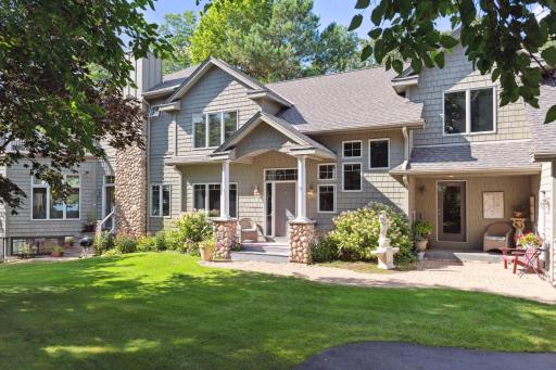 An attractive exterior includes James Hardie siding, River Rock Accent, Gutter Helmet Gutter protection and new roof in 2015. There's the formal entrance as well as a service entrance or deliveries and interior entrance from the attached garage.