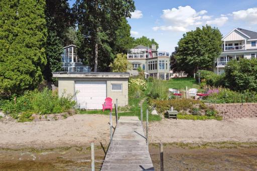 Sandy lakefront and beach with a 26x16 boathouse are rare to come by on Lake Minnetonka.
