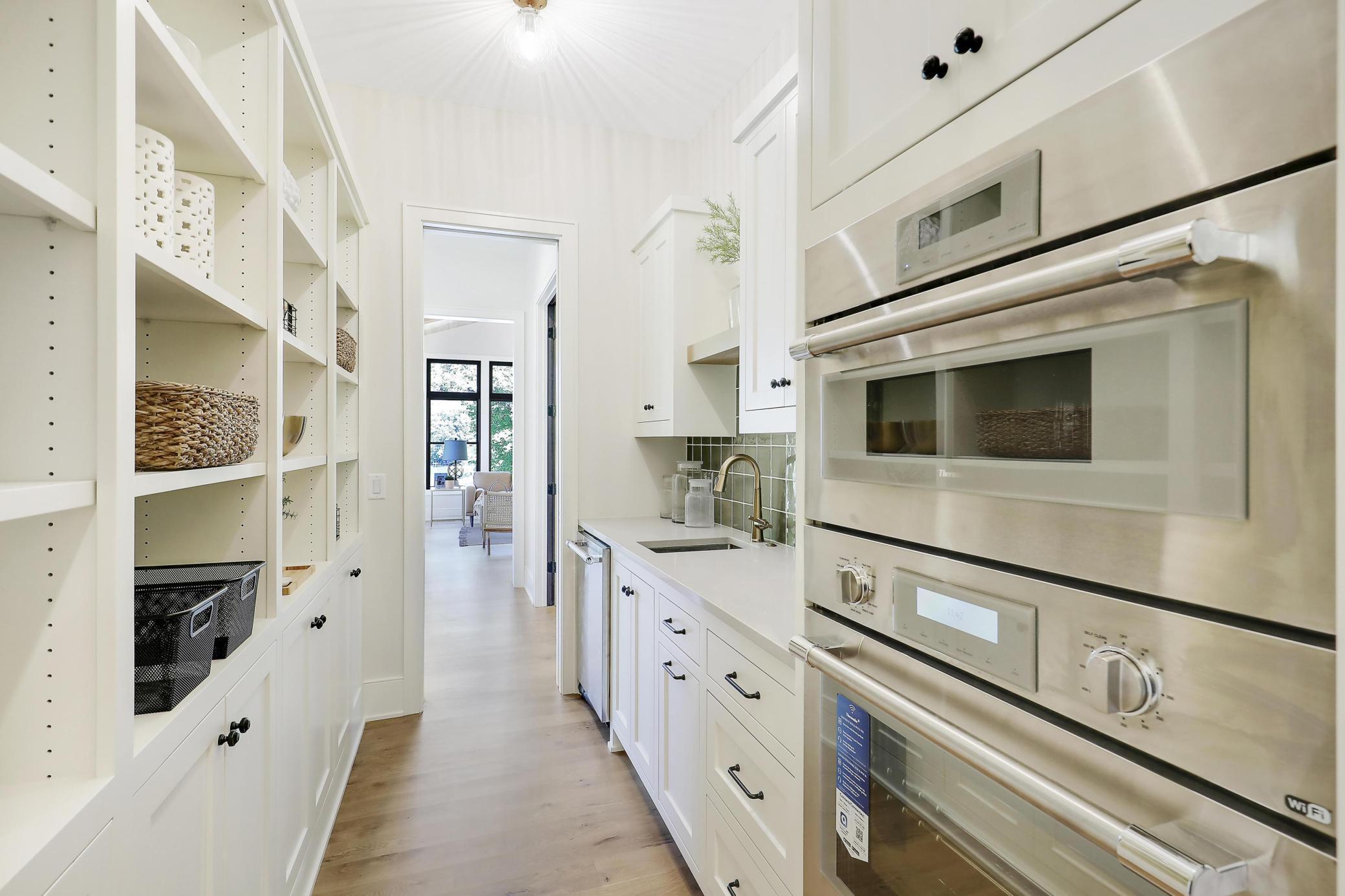 Back Kitchen With Sink, 2nd Dishwasher and Ovens.