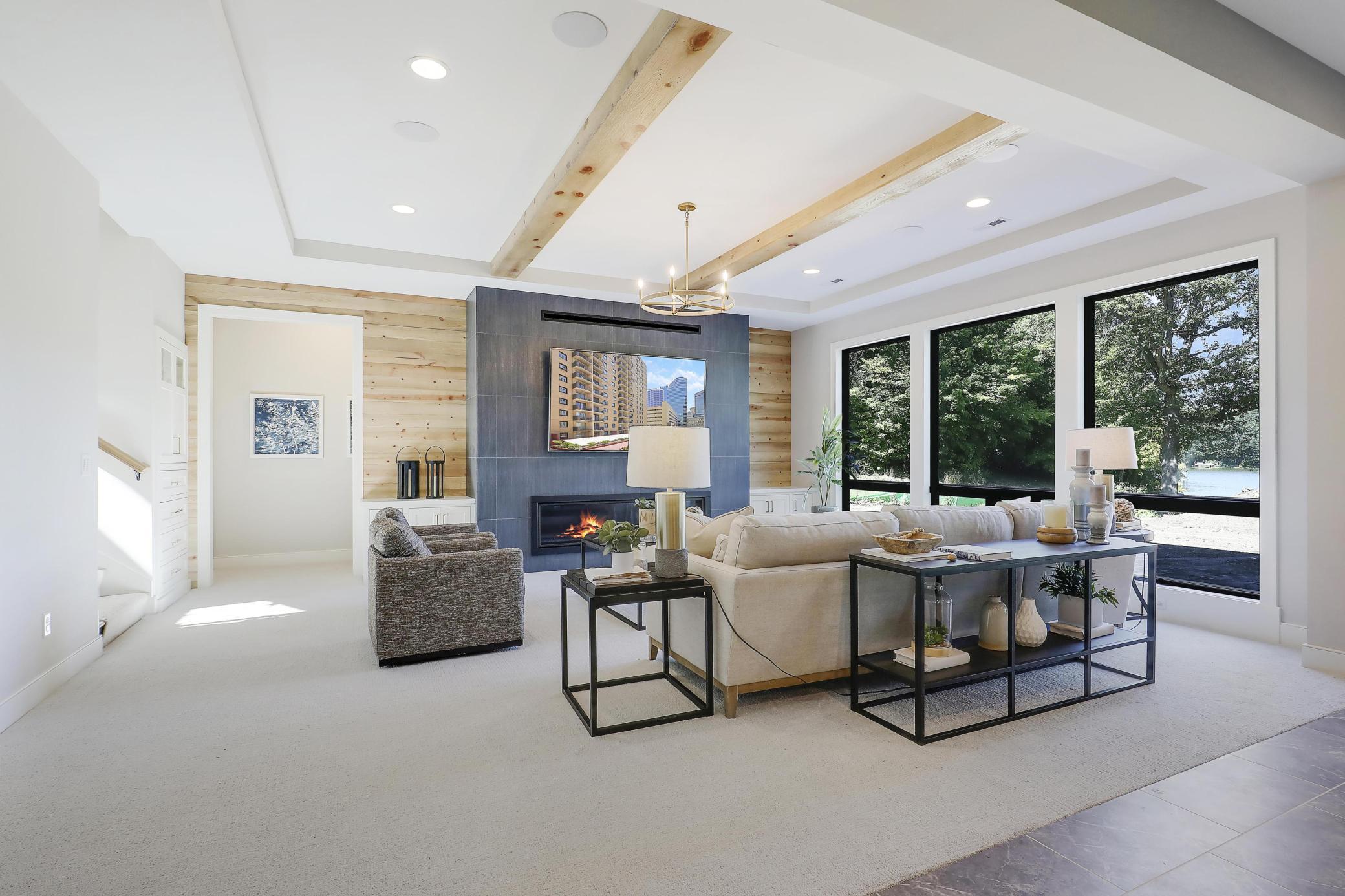 Exceptional Lower Level Ceiling Heights With Beamed Ceiling & Soft