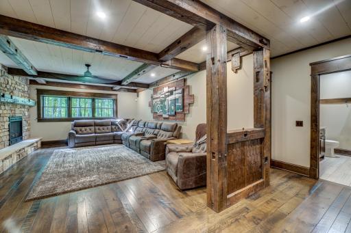 Downstairs youâll find a full laundry room, full bathroom, 2 bedrooms, and 2 flex rooms (one roughed-in for a full kitchen). The lower-level family room is equipped with surround sound as well, and a gas fireplace.