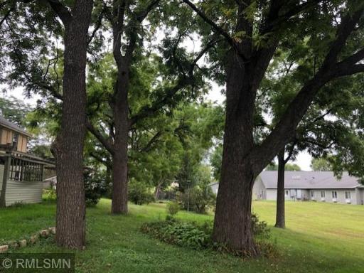 Many large walnut trees provide shade to the home and lot.