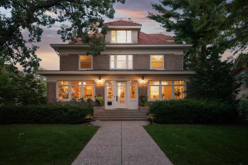 Absolutely amazing 1900’s stunner located on Lake Harriet Parkway offers beautiful lake views!