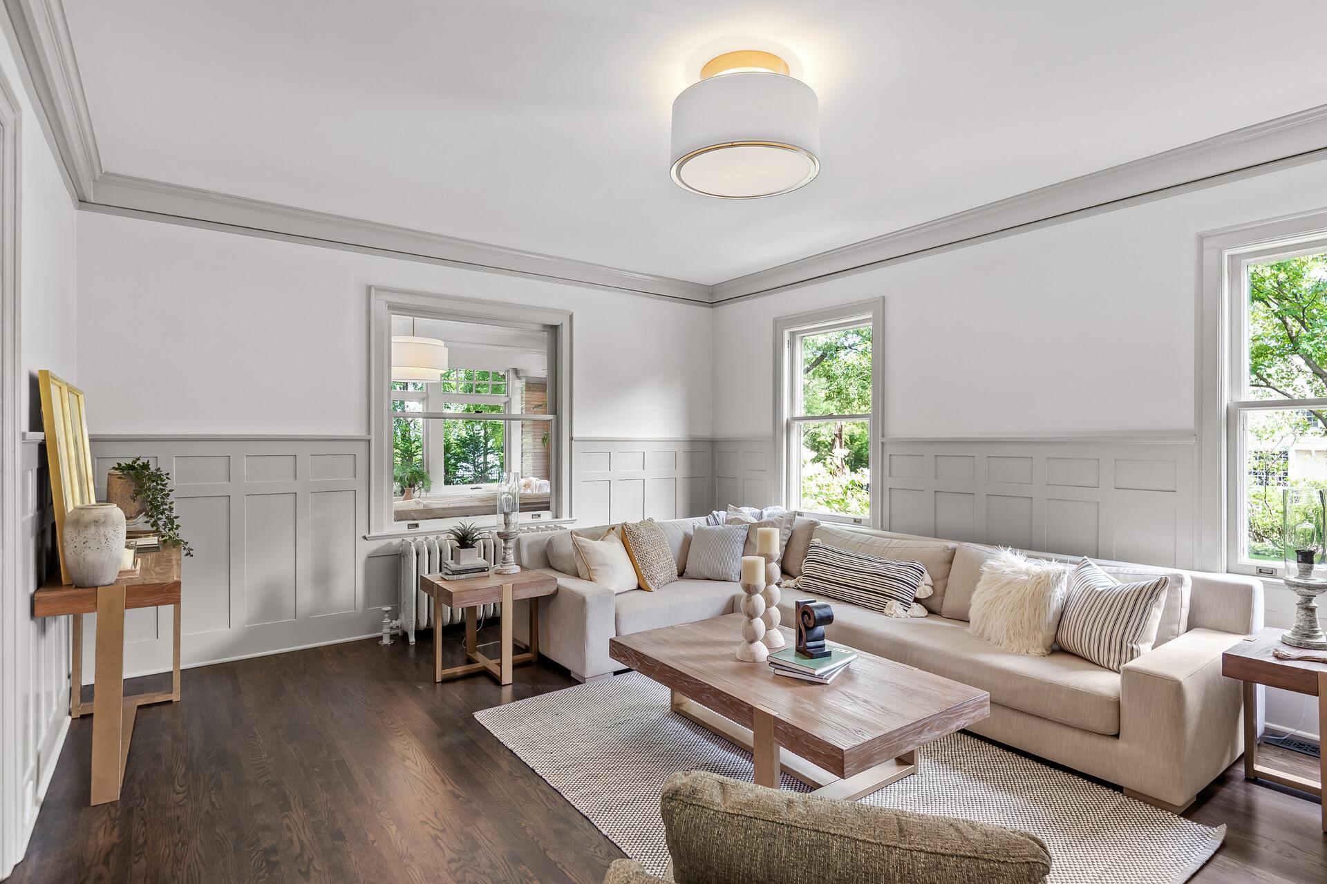 Intricate and elegant custom millwork throughout - make sure you look up at the impressive coffered ceilings! 10-foot ceilings throughout the main level.