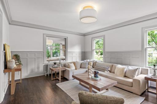 Intricate and elegant custom millwork throughout - make sure you look up at the impressive coffered ceilings! 10-foot ceilings throughout the main level.