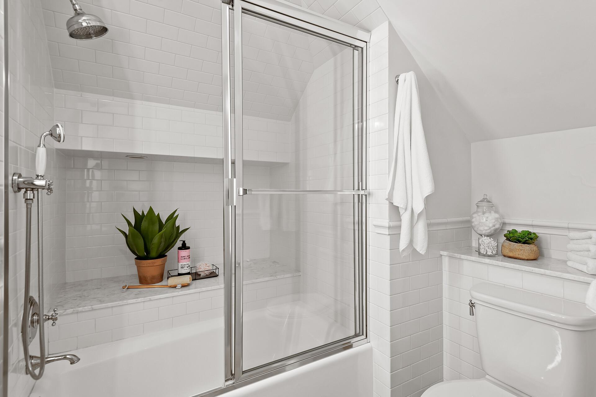 You will love this full bathroom on the 3rd level, beautiful tile surround, and a spa-like soaking tub perfect for enjoying a bubble bath!