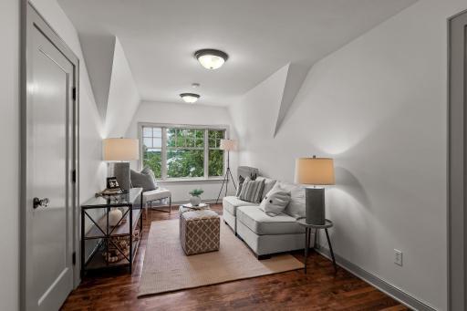 The 3rd level is full of charm and character! Presents this fabulous living room space with an amazing view!