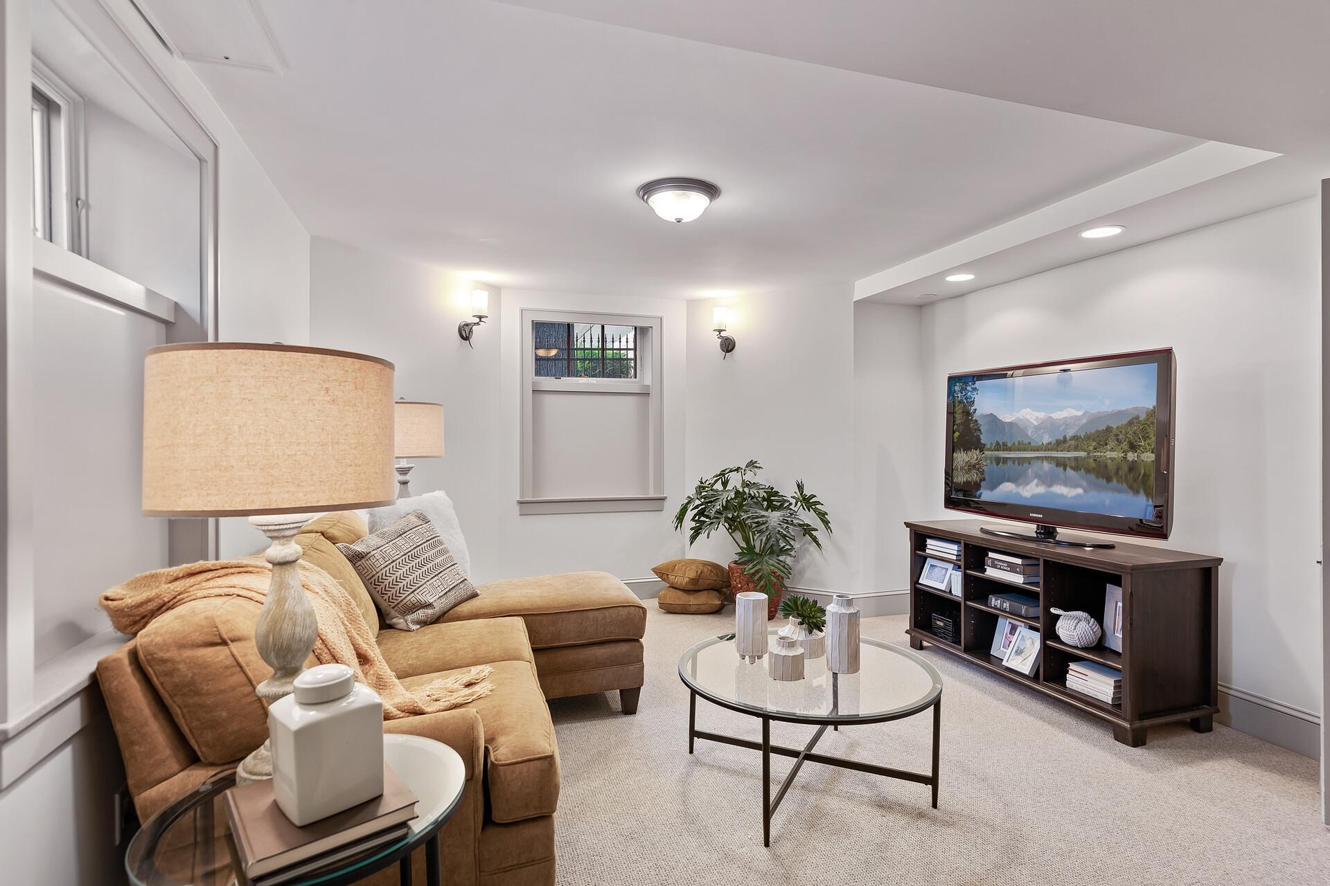Finished lower level has a lot to offer including this cozy family room!