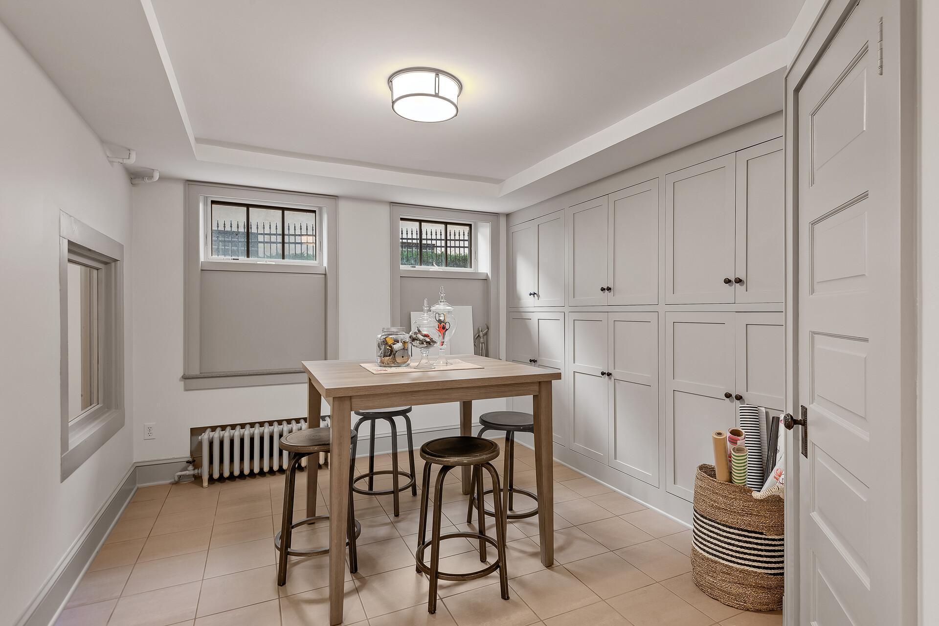 Great craft room with a wealth of built-in storage.