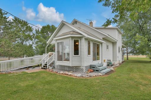 Beautiful country home with front screen porch, maintenance free exterior and new roof(soon).