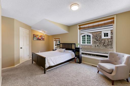 Upper level 2nd Bedroom features a walk-in closet and private Full Bathroom