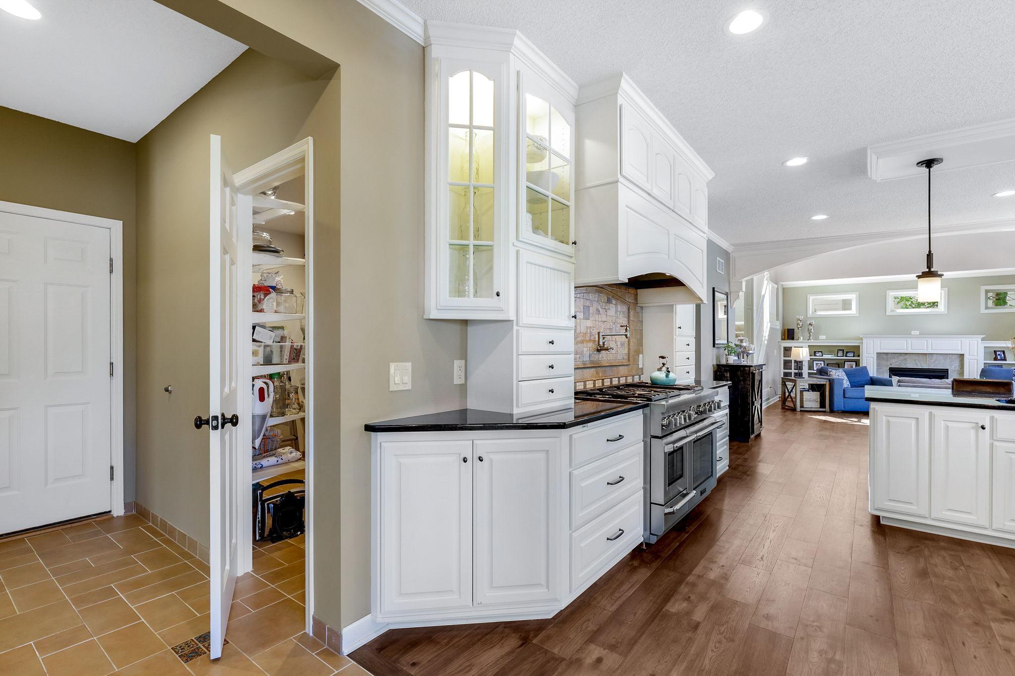 Large walk-in pantry includes an additional refrigerator