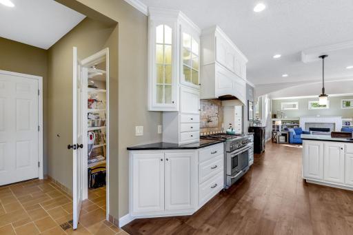 Large walk-in pantry includes an additional refrigerator