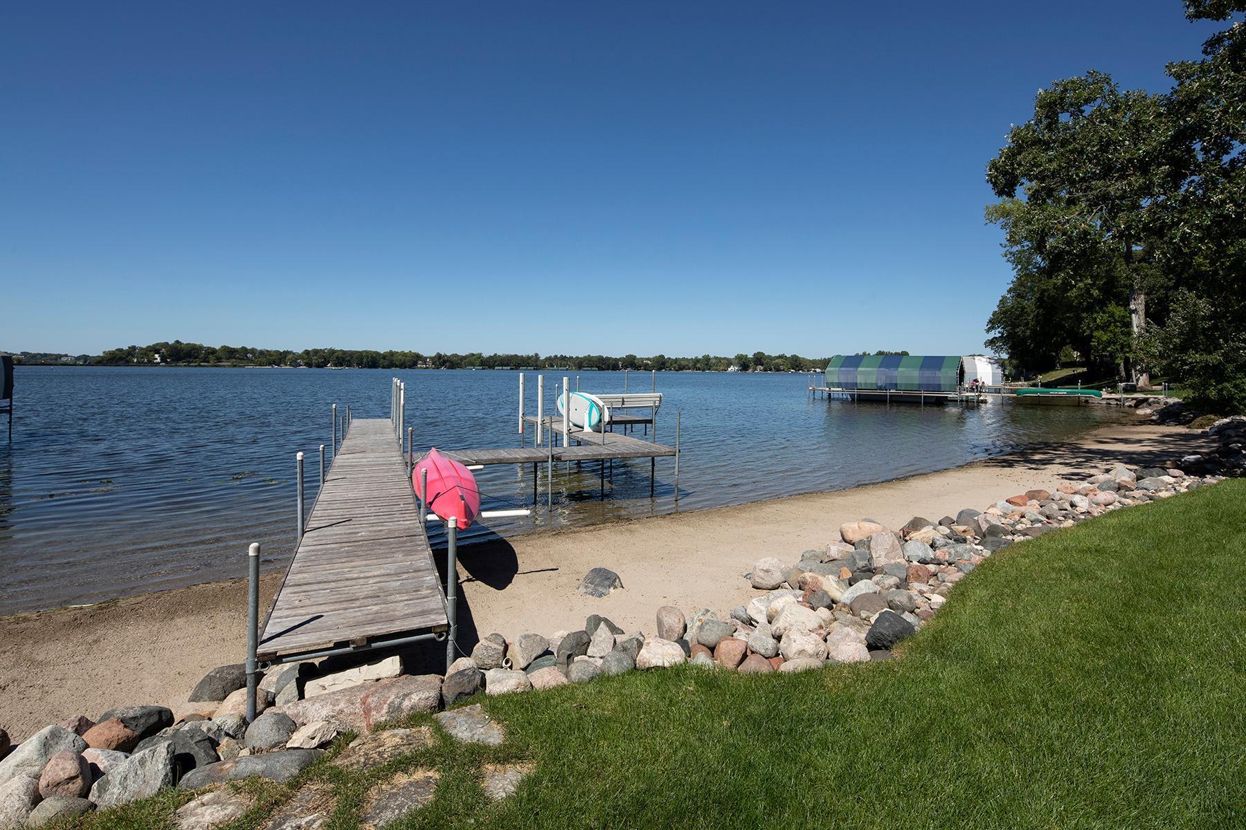 142 feet of sandy west facing lakeshore on Lake Minnetonka