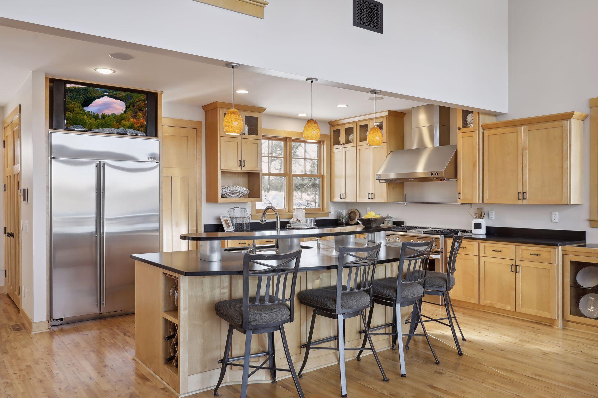 This kitchen was made for how you live and entertain! With an elevated island with seating for informal meals, homework, or conversations, this is sure to be the heart of the home. Don't miss the hidden walk-in pantry.