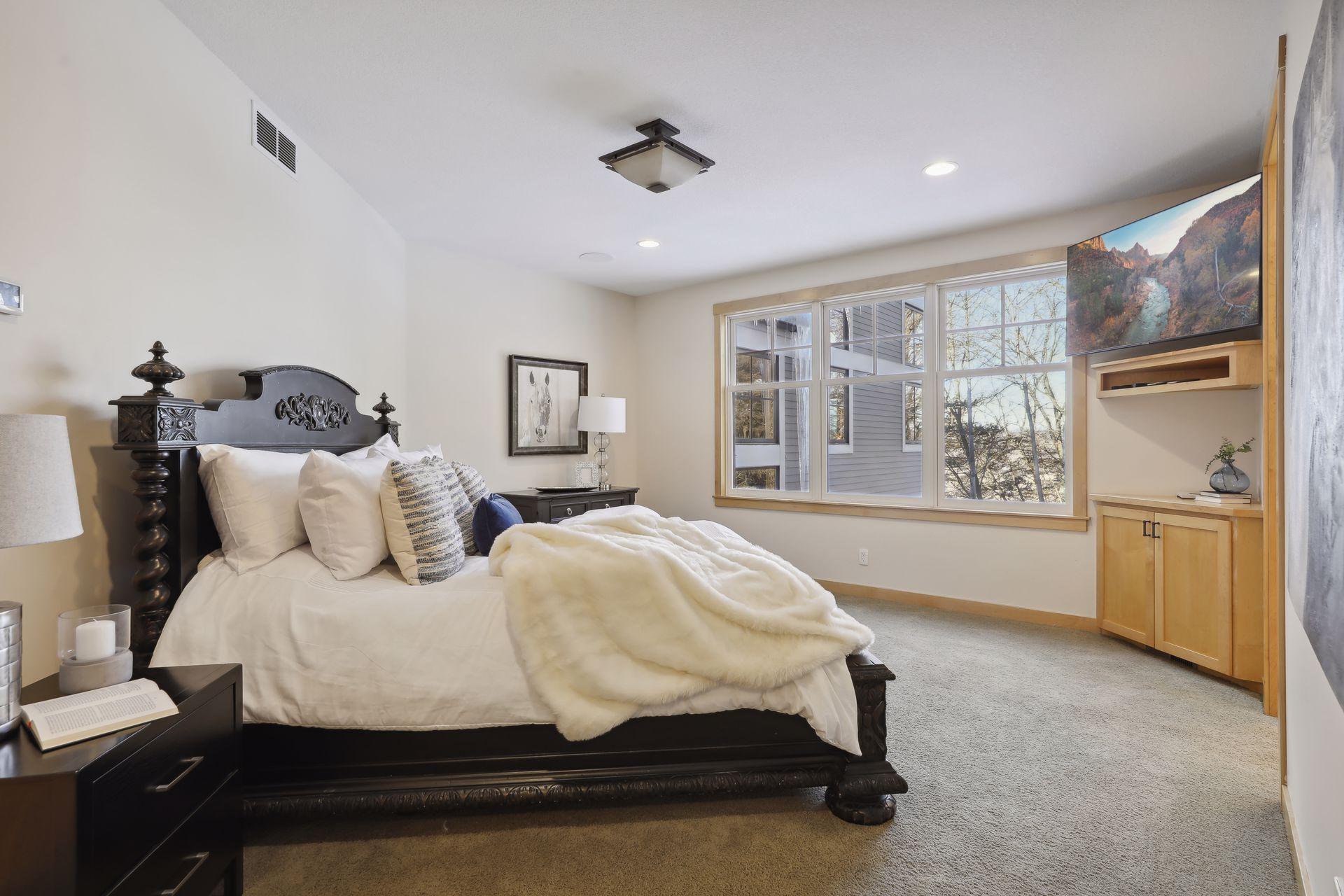 The main level owner's suite enjoys views out to the river.