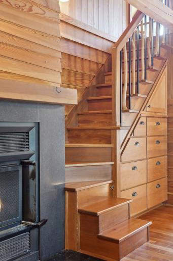 A wooden staircase leads to a 3rd bunk room, shared by suite 3 and 4.