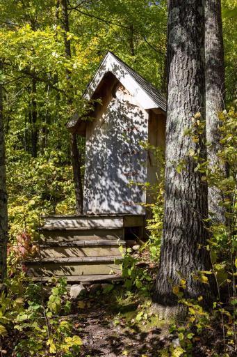 Dual outhouse with slate roof