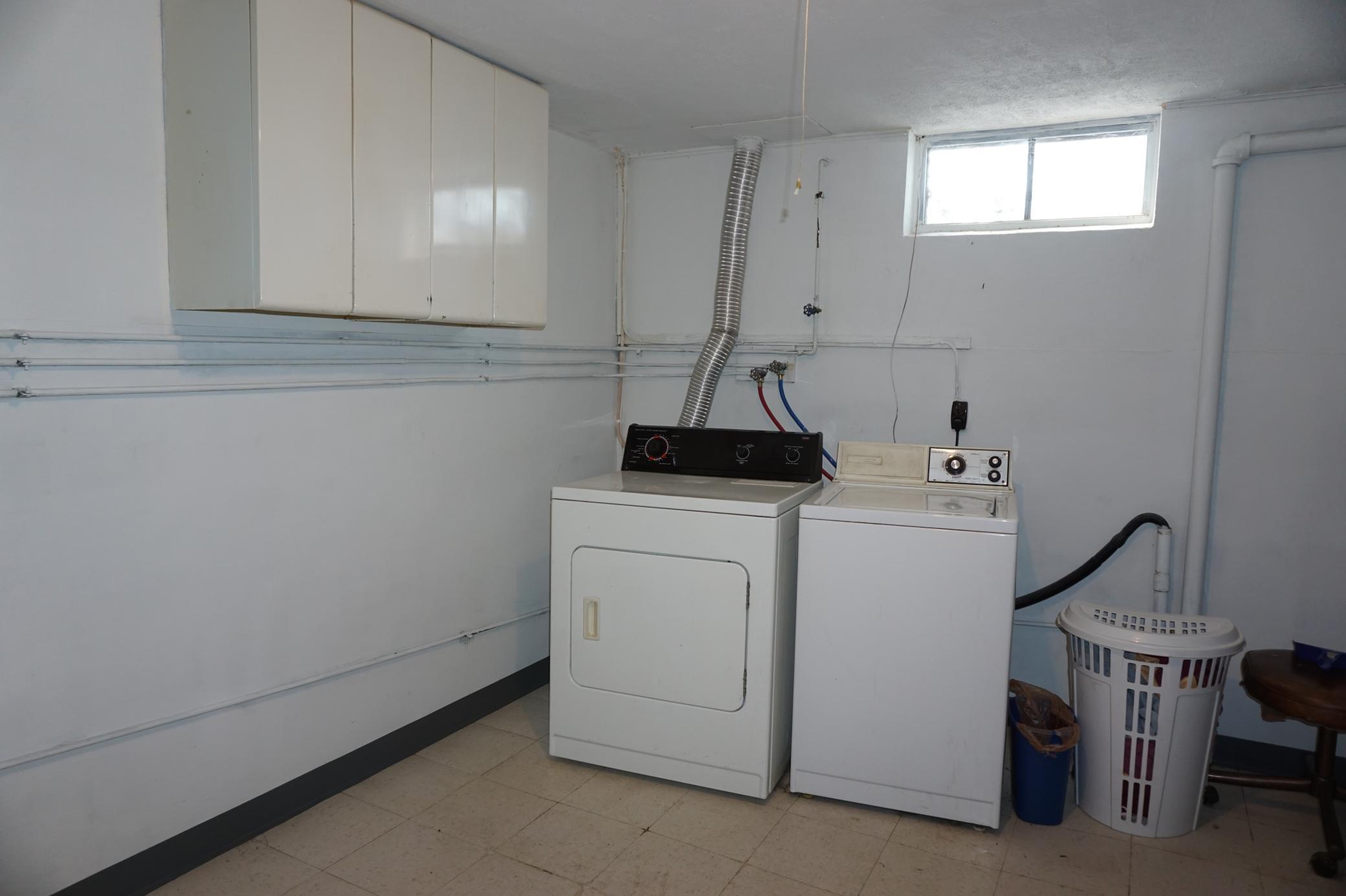 Large Laundry with cabinets