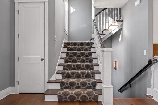 Up this grand staircase you will find 4 bedrooms + a loft. Come on up!