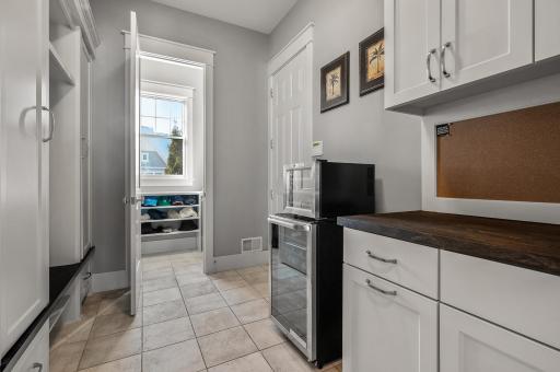 Entrance off the mudroom makes for a great drop space for keys, bags, hats etc.
