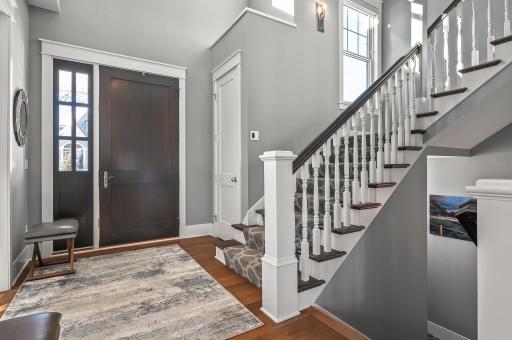 Stairwell leading up with oversized windows