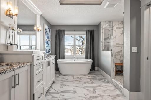 Primary suite feels like your in a luxury resort