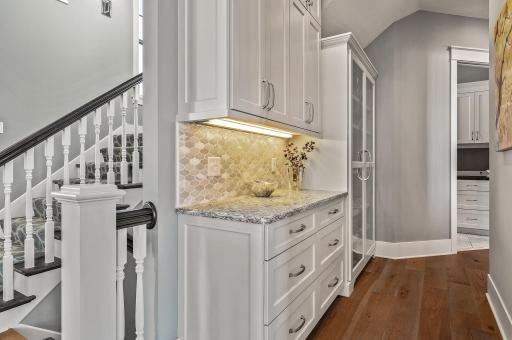 Under cabinet lighting present throughout kitchen