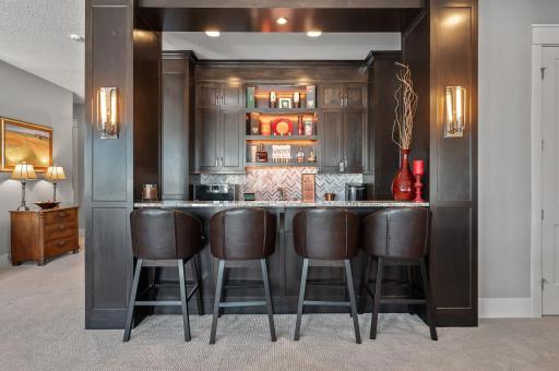 The elegance in this custom bar is impeccable