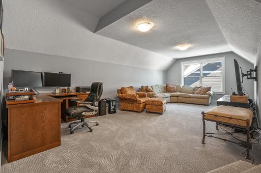 Huge loft space makes for a great play room/movie space
