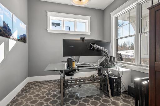 One of two offices/flex spaces on the main level