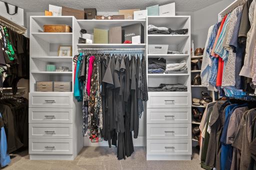 Just a glimpse of the storage available in the primary suite closet